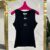 Chic and Edgy: Cut Sleeve Celine Shirt - Black