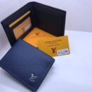 Louis Vuitton Wallets. Each wallet, complete with its elegant box, is a statement of vibrant luxury and impeccable design - 25