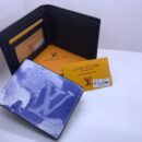 Louis Vuitton Wallets. Each wallet, complete with its elegant box, is a statement of vibrant luxury and impeccable design - 18