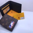Louis Vuitton Wallets. Each wallet, complete with its elegant box, is a statement of vibrant luxury and impeccable design - 12