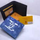 Louis Vuitton Wallets. Each wallet, complete with its elegant box, is a statement of vibrant luxury and impeccable design - 15